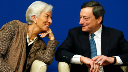 International Monetary Fund (IMF) Managing Director Christine Lagarde (L) and European Central Bank (ECB) President Mario Draghi attend the conference "Growth and integration in solidarity: what strategy for Europe?" with top financial officials at the Economy ministry in Paris November 30, 2012.