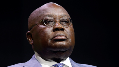 Ghana's president Nana Akufo-Addo with a focused emotionless look, his head tilted upwards