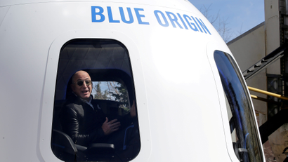 Jeff Bezos is seen inside a Blue Origin spacecraft