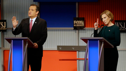 Ted Cruz speaks as Carly Fiorina tries to make a comment during Republican presidential debate at Milwaukee Theatre, Tuesday, Nov. 10, 2015, in Milwaukee.