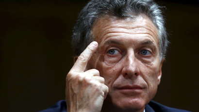 Argentina's president-elect Mauricio Macri smiles during a news conference in Buenos Aires, Argentina, November 23, 2015. Argentines assets rose broadly on Monday after conservative opposition challenger Macri scraped to victory in the presidential election, ending more than a decade of rule under the Peronist movement