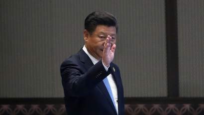 China's President Xi Jinping waves as he arrives at a news conference after the closing of G20 Summit in Hangzhou, Zhejiang Province, China, September 5, 2016.