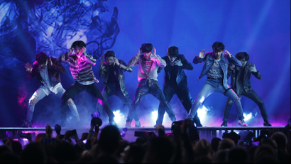 The Korean pop band BTS performing.