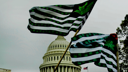 Marijuana flags fly near the Capitol.