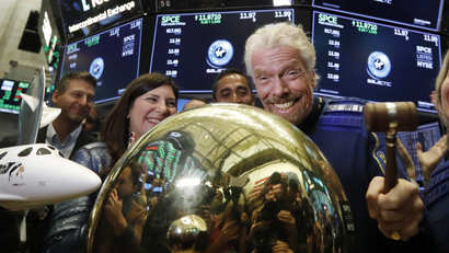 Richard Branson strikes a NYSE bell