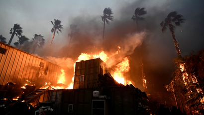 A home is engulfed in flames during the Woolsey Fire in Malibu, California, U.S. November 9, 2018.
