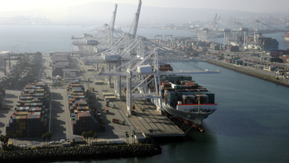 A container ship is docked at the Ports of Los Angeles and Long Beach, California.