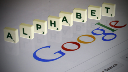 Letters spell the word "Alpahbet" as they are seen on a computer screen with a Google search page in this photo illustration taken in Paris