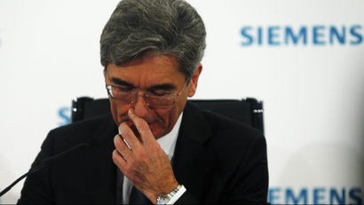 Joe Kaeser, chief executive of German industrial group Siemens, addresses a news conference.