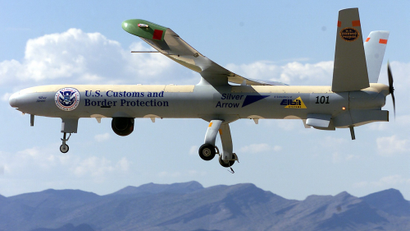 The U.S. Border Patrol's new unmanned-aerial-vehicle or UAV is shown in flight at Fort Huachuca, Ariz., Friday, June 25, 2004. The unmanned drone, launched by the Border Patrol on Friday, uses thermal and night-vision equipment to help agents spot illegal immigrants trying to cross the desert into the United States.