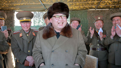North Korean leader Kim Jong Un attends a demonstration of a new large-caliber multiple rocket launching system at an unknown location, in this undated file photo released by North Korea's Korean Central News Agency (KCNA) on March 22, 2016.