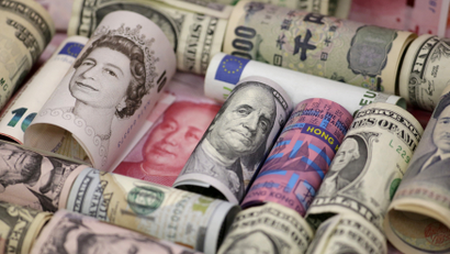 Euro, Hong Kong dollar, U.S. dollar, Japanese yen, British pound and Chinese 100-yuan banknotes are seen in a picture illustration shot January 21, 2016.