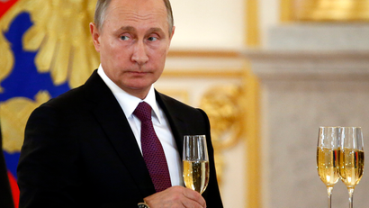 Russian President Vladimir Putin makes a toast during a ceremony for receiving diplomatic credentials from foreign ambassadors in the Kremlin in Moscow, Russia, Wednesday, Nov. 9, 2016. Putin says that Moscow is ready to try to restore good relations with the United States in the wake of the election of Donald Trump.