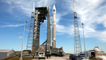 The United Launch Alliance Atlas V rocket and Orbital ATK Cygnus spacecraft stack sits on the launch pad at Cape Canaveral Air Force Station in Cape Canaveral, Fla., Monday, March 21, 2016. The cargo carrier is scheduled to launch Tuesday, March 22, and holds a commercial-quality 3D printer for astronaut as well as public use, for a price.