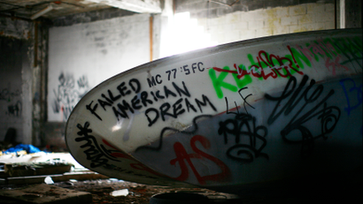A boat filled with graffiti is seen inside the abandoned and decaying manufacturing plant of Packard Motor Car in Detroit