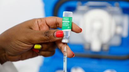 A medical worker prepares a dose of AstraZeneca's Covid-19 vaccine in Nairobi in April 2021.