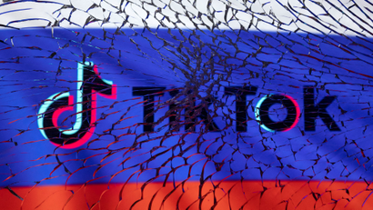 TikTok's cracked logo on the Russian flag