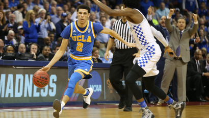 Mar 24, 2017; Memphis, TN, USA; UCLA Bruins guard Lonzo Ball (2) drives to the basket against Kentucky Wildcats guard De'Aaron Fox (0) in the second half during the semifinals of the South Regional of the 2017 NCAA Tournament at FedExForum. Mandatory Credit: Nelson Chenault-USA TODAY Sports - RTX32MPS
