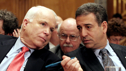 FILE - In this Jan. 25, 2006 file photo, Sen. John McCain, R-Ariz., left, chats with Sen. Russ Feingold, D-Wis. on Capitol Hill in Washington. The Supreme Court has raised a range of high-stakes possibilities that could substantially scale back the hard-won 2002 Bipartisan Campaign Reform Act, also named the McCain-Feingold law after its sponsors, and let corporations, unions and wealthy individuals pour money into elections in time for this year's congressional races, not to mention the 2012 presidential contest; a ruling is expected as early as Tuesday, Jan. 12, 2010. (
