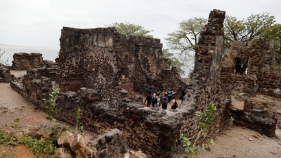 Tourists visit the ruins of Kunta Kinte island in the Gambia River, near Jufureh, Albreda