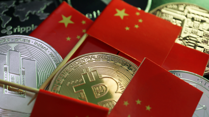 Chinese flags and crypto coins.