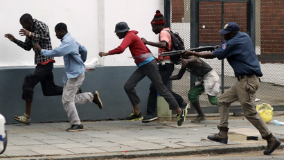 Photos: An anti-immigration march in South Africa sparks violence