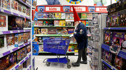 Santa Fred Osther from Oslo, Norway shops at a Toys R Us during a field trip from the Charles W. Howard Santa Claus School in Midland, Michigan, U.S. October 28, 2016. REUTERS/Christinne Muschi