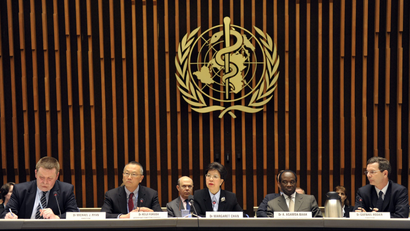 Representatives of WHO speak at a news conference