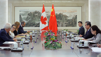 Canada's Foreign Minister Chrystia Freeland, second left, and China's Foreign Minister Wang Yi, second right, hold a meeting at the Ministry of Foreign Affairs in Beijing,