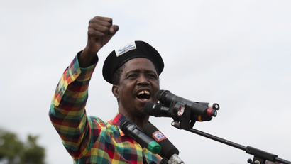 Patriotic Front (PF) Presidential candidate Edgar Lungu speaks at a rally in Lusaka January 19, 2015. Lungu's rapid rise from backroom politician to presidential front-runner in one of Africa's most promising frontier markets has revealed tactical nous and a steely determination that few knew lay beneath his quiet exterior. Zambians go to the polls on January 20, 2015 following the death of President Michael Sata in October 2014.