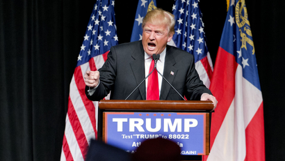 In this Feb. 21, 2016, photo, Republican presidential candidate Donald Trump speaks at a campaign event in Atlanta. Trump has repeated inaccurate and racially-charged crime statistics, reposted pledges of support from white supremacists and retweeted dubious questions about the citizenship of his presidential rivals to an online following that includes more than six million people on Twitter alone. His response when challenged? To dismiss it all as nothing more than a harmless "retweet." (AP Photo/David Goldman)