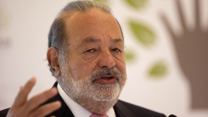 Mexican telecommunications tycoon Carlos Slim speaks during news conference at the Soumaya museum in Mexico City,Monday, Jan. 14, 2013. Slim announced an educational partnership between his Carlos Slim Foundation with the Khan Academy. (AP Photo/Dario Lopez-Mills