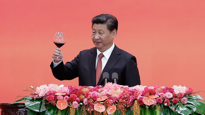 Chinese President Xi Jinping offers a toast after delivering a speech during a reception to mark the 70th anniversary of Japan's surrender during World War II in Beijing, Thursday, Sept. 3, 2015. (Lintao Zhang