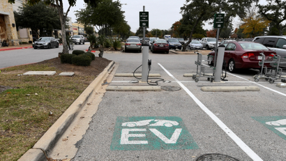 Electric vehicle charging station at parking lot.