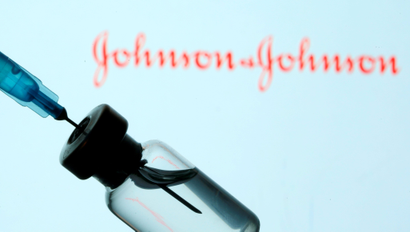An image of a vial and a syringe in front of the Johnson and Johnson logo.
