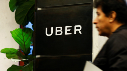 A man exits the Uber office
