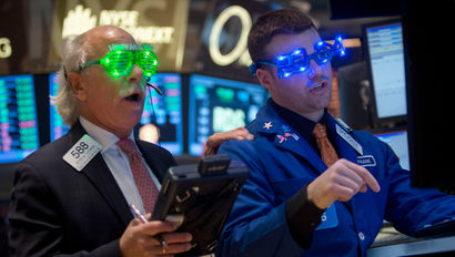 raders at the closing bell on the floor of the New York Stock Exchange on New Year's Eve