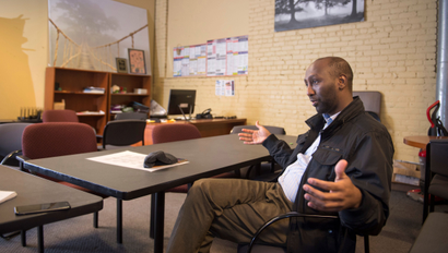 Mohamud Noor, Executive Director of the Confederation of Somali Community in Minnesota talks with a reporter in his office ahead of the NFL's Super Bowl in Minneapolis, Minnesota, U.S. January 19, 2018. Picture taken January 19, 2018.