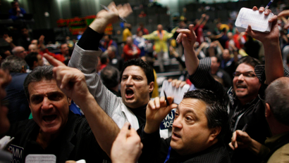 Traders work in the S&amp;P 500 pit at the Chicago Mercantile Exchange's Chicago Board of Trade