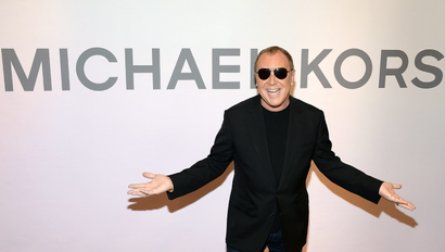 Designer Michael Kors attends the Miranda Eyewear Collection launch event at his SoHo Flagship store, on Wednesday, Feb. 18, 2015, in New York. (Photo by Evan Agostini/Invision/AP)