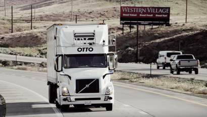 An Otto truck on the road.