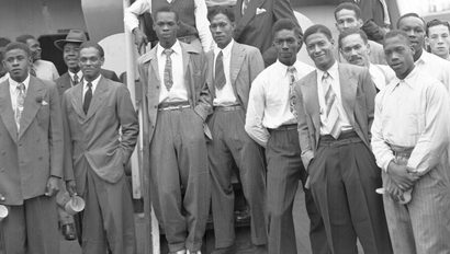 Some of the Jamaican men, mostly ex Royal Air Force servicemen, aboard the former troopship, S.S. Empire Windrush, before disembarking at Tilbury Docks, England, on June 22, 1948. They have come to Britain seeking employment.