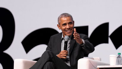 Former president Barack Obama speaks to Qualtrics CEO Ryan Smith at Qualtrics X4 Experience Summit in Salt Lake City, 2019.