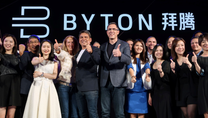 Carsten Breitfeld (centre L) and Daniel Kirchert (centre R), co-founders of electric vehicle (EV) startup Byton, attend a news conference in Beijing, China April 20, 2018.