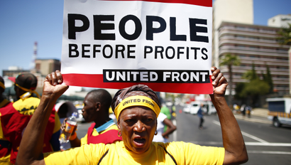 Members of the Democratic Left Front, various trade unions and NGO's protest outside parliament ahead of South African Finance Minister Nhlanhla Nene's 2015 budget speech to parliament in the National Assembly, Cape Town, 25 February 2015. Minister Nene delivered his first budget in his new capacity and announced hikes in both tax and fuel levies as a way of funding the 1.2 Trillion Rand budget.