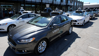 A fleet of Uber's Ford Fusion self driving cars in Pittsburgh.