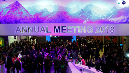 Attendees take part at a reception event after the Crystal Award ceremony during the World Economic Forum (WEF) annual meeting in Davos