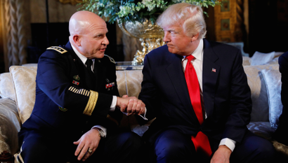 President Donald Trump shakes hands with his new National Security Adviser Army Lt. Gen. H.R. McMaster.