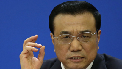 China's Premier Li Keqiang gestures as he speaks during the annual news conference following the closing session of the National People's Congress (NPC), or parliament, at the Great Hall of the People in Beijing March 15, 2015. REUTERS/Jason Lee