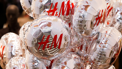 Balloons with the logo of Swedish fashion retailer Hennes &amp; Mauritz (H&amp;M) are pictured at its newly opened store in central Moscow, Russia, May 27, 2017. REUTERS/Maxim Shemetov - RC157D450940